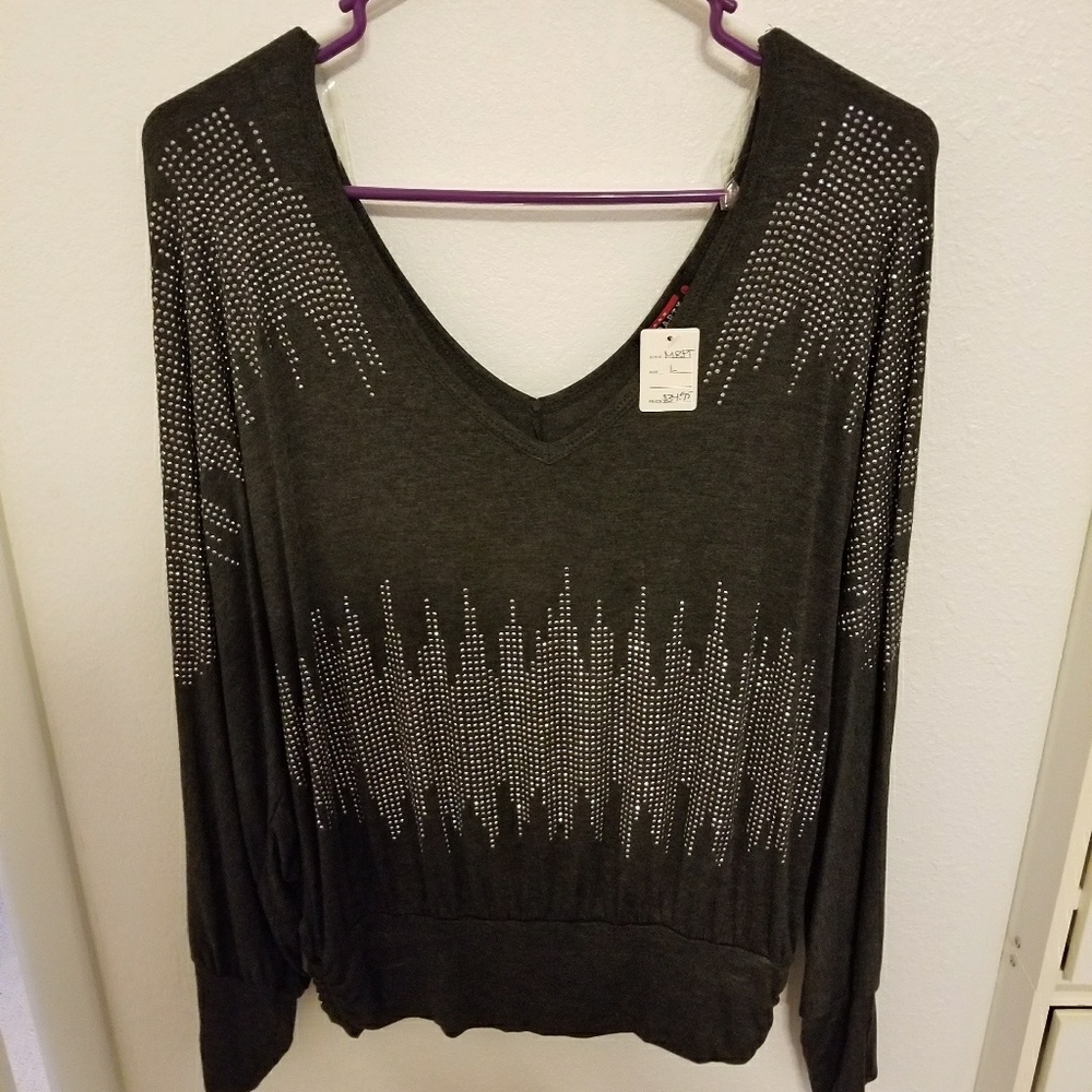 Brand new sparkly long sleeved gray shirt.